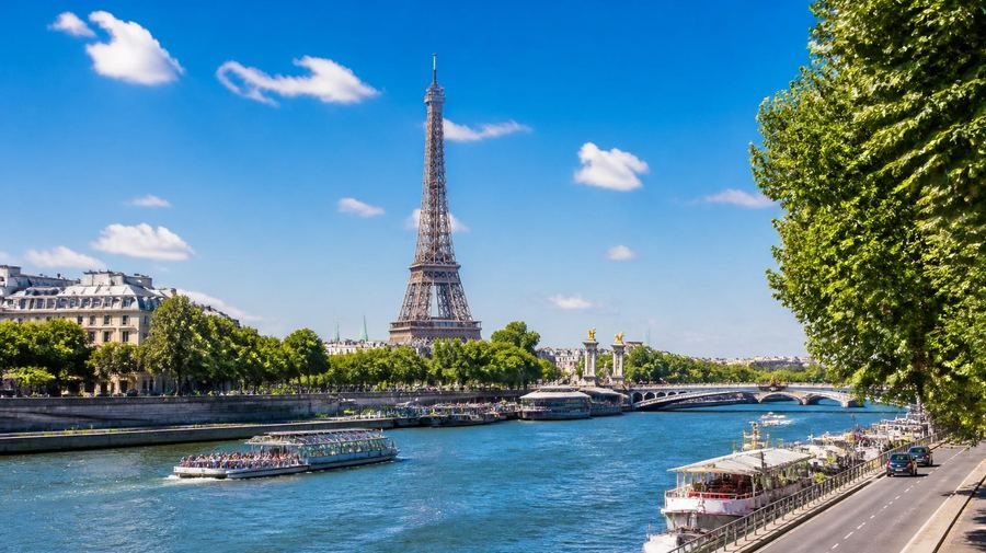 The Eiffel Tower in Paris, France, seen along the Seine river